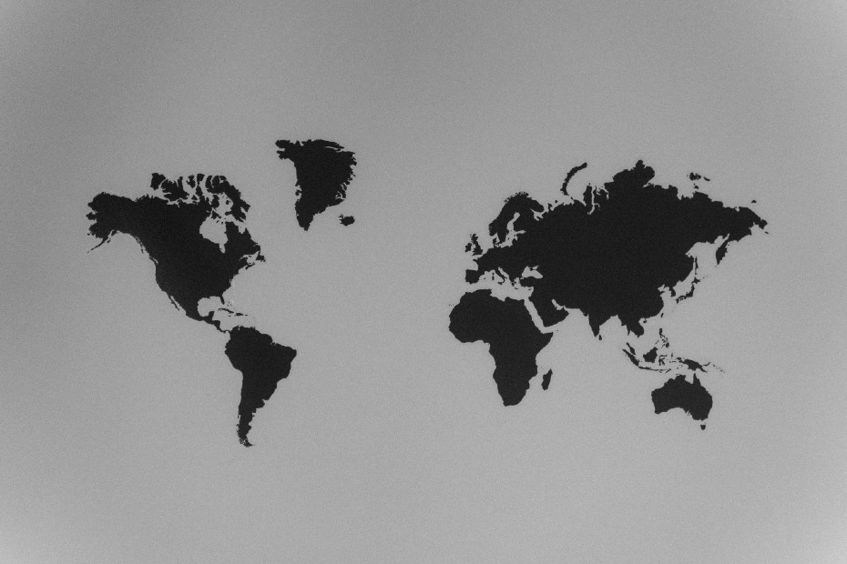 A world map on a grey background